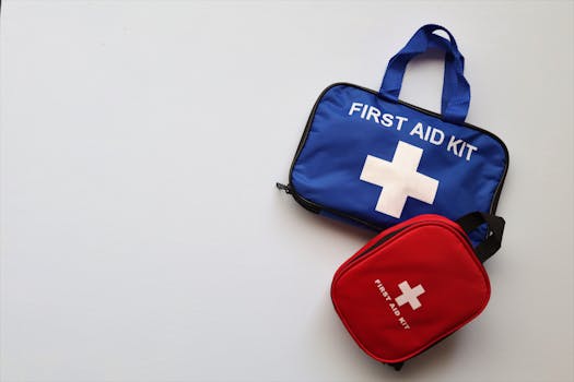 Two first aid kits on a white background with ample copy space.